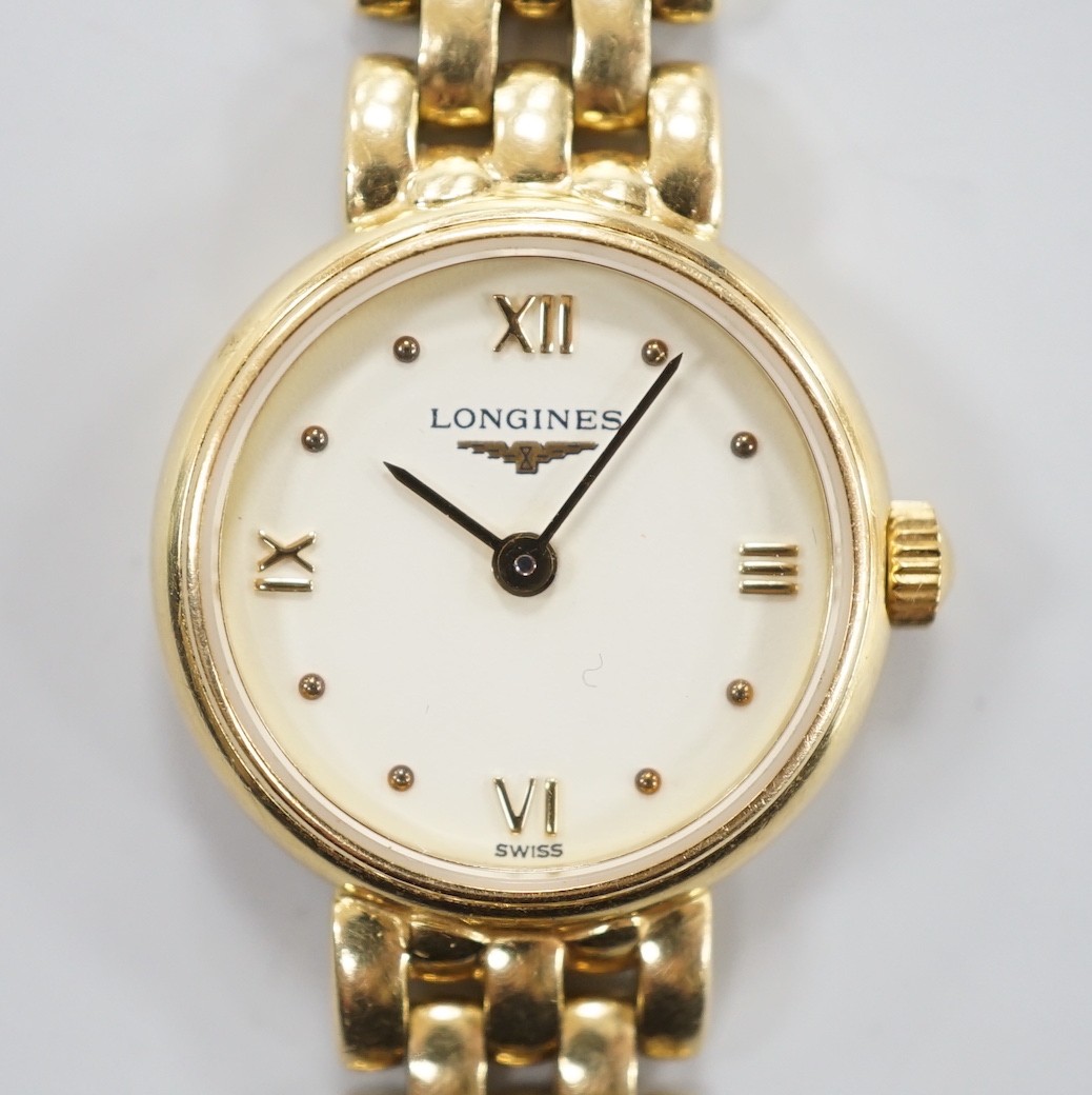 A lady's 2001 18ct gold Longines quartz wrist watch, on an 18ct gold Longines bracelet, overall length 18cm, gross weight 29.2 grams, with box and papers.
